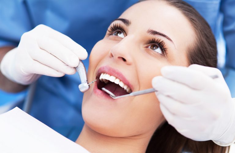 Bright dental office with a clean dentist chair and dental tools arranged neatly