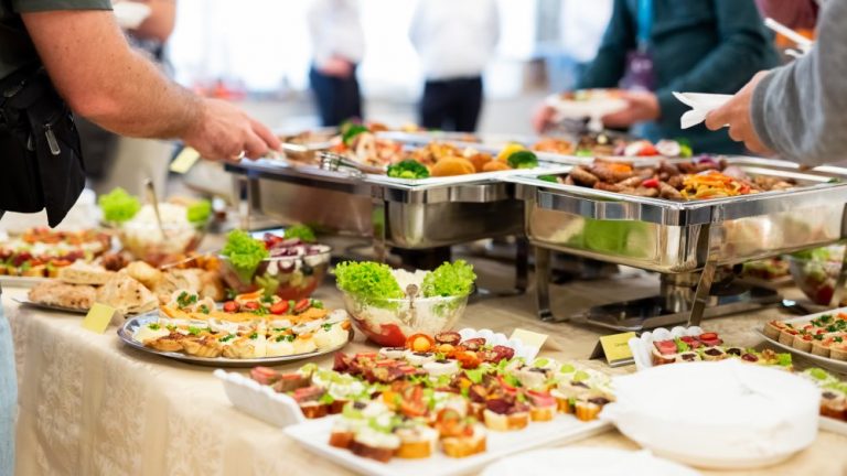 Price comparison chart showing Golden Corral buffet costs for adults, seniors, and children across breakfast, lunch, and dinner service times